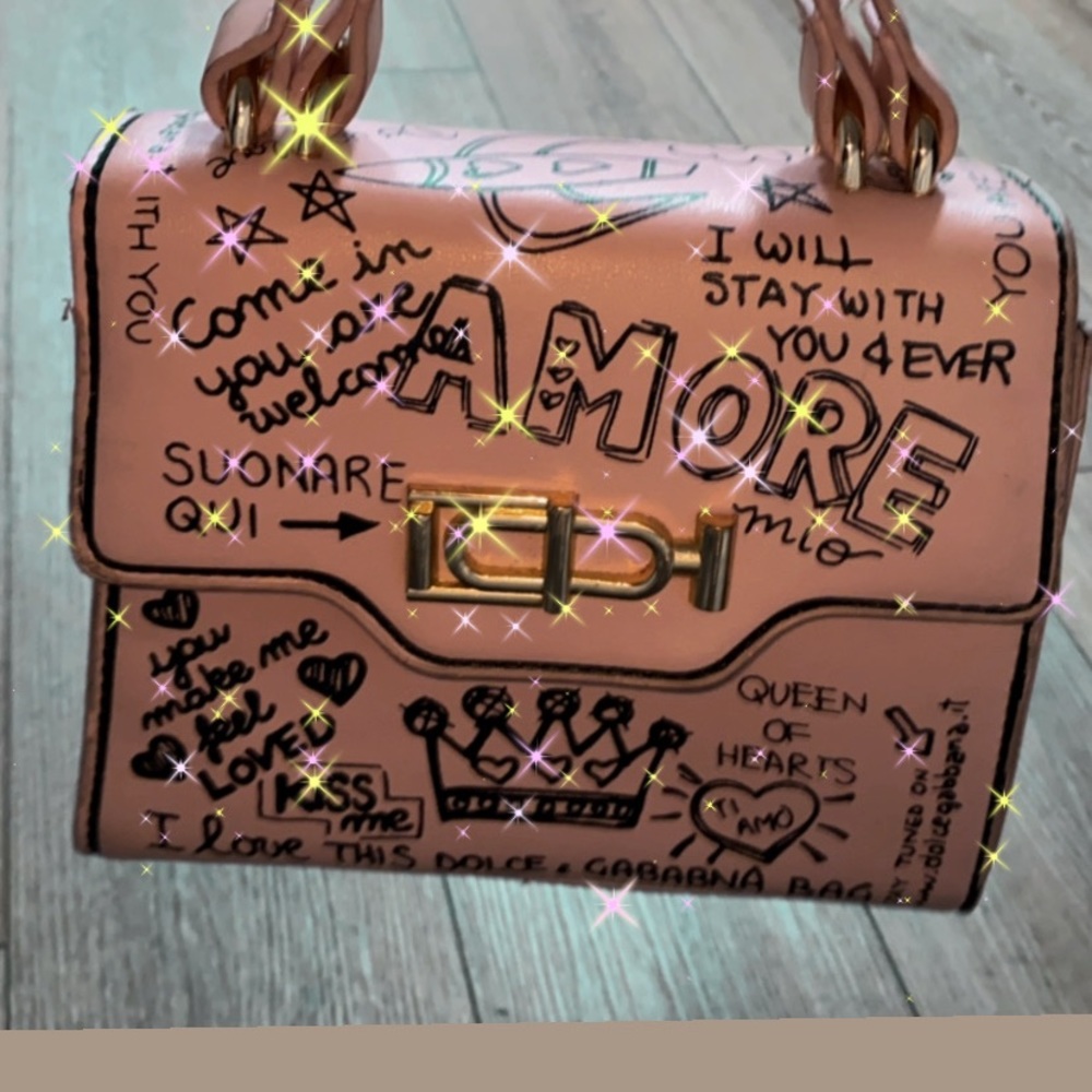 Pink and black graffiti handbag